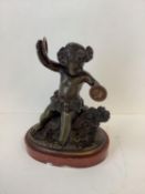 After Clodion, bronze figure of a Putti, on marble base, 17cm High