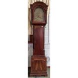 Georgian mahogany longcase clock with embossed brass arched dial, twin winding holes, date apertures