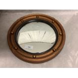 Small circular Irish style gilt painted convex wall mirror with ball decorations to the frame 42