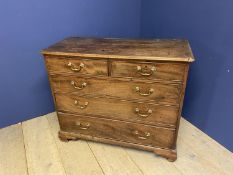 Georgian mahogany chest of 2 short over 3 long graduated drawers with brass drop handles on shaped