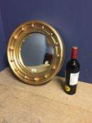 Small circular Captains mirror, with ball finials, 27cm diameter overall