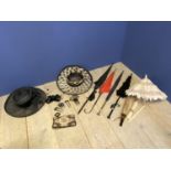 Vintage hair combs, vintage umbrellas including an Edwardian silk and folding bone ladies parasol, a