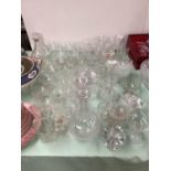 Qty of drinking glasses, including sets and part sets of champagne saucers, vine etched wine glasses