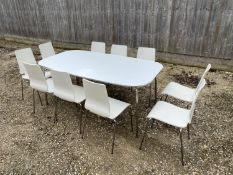 Ikea modern white moulded and chrome table 180L x 100 w and Set of 10 chairs. Condition sound some