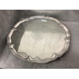 Large George III silver salver by Ebenezer Coker, London 1764 39 cm dia engraved central coat of