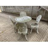White painted aluminium table and 4 chairs . Condition. Very worn paint flaking