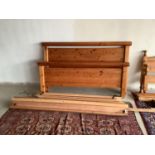 Waxed pine double bed with roll top head and foot boards 152cm wide approx/ 5 ft