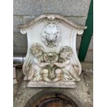 Large white painted moulded concrete wall plaque with lion mask fountain head raised on a sink well