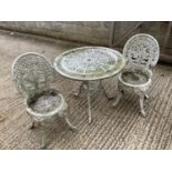 White painted aluminium table and 2 chairs . Condition. Very worn paint flaking