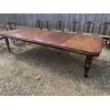 Good Victorian heavy mahogany oblong extending dining table with 3 leaves 137 cm W x 314 cm extended