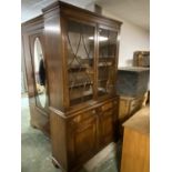 Good quality modern mahogany bookcase with a pair of glazed doors over 114 L x 206 H Condition -