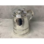 A George III silver quart tankard engraved Armorials of Storey and Bell, with girdle moulding,