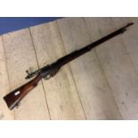 De activated C19th Lee Enfield bolt action rifle, numbered G 319 /12080 , engraved to the stock OX