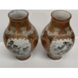 A pair of Japanese C19th Kutani porcelain vases 25 cm H One with a glued crack to the neck