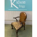 C19th mahogany library armchair on cabriole legs to ball and claw feet upholstered in good vintage