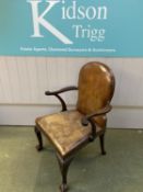 C19th mahogany library armchair on cabriole legs to ball and claw feet upholstered in good vintage