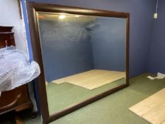 Very large bevelled glass wall mirror, set within brown frame, 223cm x 180cm overall