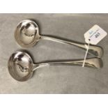 A pair of Victorian old English pattern silver sauce ladles by Reid and Sons Newcastle 1874