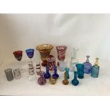 Qty of glassware including Bohemian ruby glass stemmed vases, 2 octagonal blue bottle signed Boda