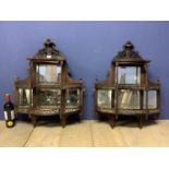 Pair of mahogany wall shelves, with fret work galleries, and four bevelled mirror backs, overall