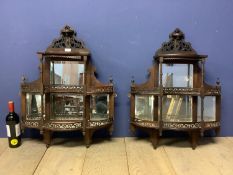 Pair of mahogany wall shelves, with fret work galleries, and four bevelled mirror backs, overall