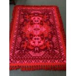 Wall Hanging with fringed tassles 7ft x 5 ft, in deep reds and pinks