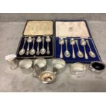 2 boxed sets of 6 hallmarked silver tea spoons - case broken. 4 Napkin rings and a 3 piece