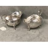 Pair George II hallmarked silver chased sauceboats, Thomas Whipham. London 1743 600 grams 20 ozt.