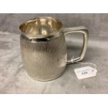 A modern design silver pint mug, the bark pattern of Gerald Benney for C J Vander Ltd London 1973