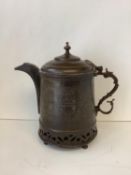 Oriental bronze jug, 30cmH, to include finial