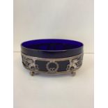 Regency Bristol blue and oval centre piece supported in a decorative silver plated stand 245 cm L