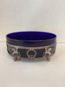 Regency Bristol blue and oval centre piece supported in a decorative silver plated stand 245 cm L