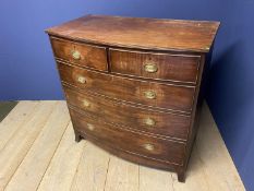 Early Victorian bow front chest of 2 short over 3 long graduated drawers with brass drop handles
