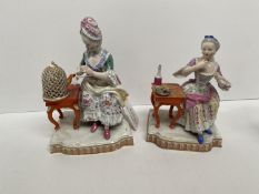 A pair of early C19th Meissen porcelain seated ladies 14 cm H One with chip to underside of base
