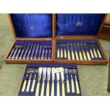 Oak cased Mappin and Webb fish eaters, 12 place settings and another Mappin and Webb 6 place