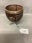 Carved coconut shell on a white metal support and a crested cartouche and rim 10 cm H