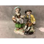 Sitzendorf small Derby figure group. Crown mark to base 11 an IT burn marks