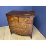 Small Victorian mahogany bow front chest of 2 short over 2 long drawers with brass drop handles
