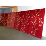 A set of 6 velvet upholstered wall panels with gold thread decoration of birds and branches,