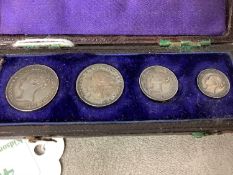 Leather case of four 1875 Maundy Coins