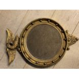 Circular bevelled glass Captains mirror, with eagle finial, 68 x 46cm