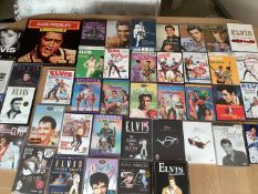 ELVIS PRESLEY MEMORABILIA: Large collection of DVDs featuring Elvis Presley and a limited edition