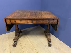 Good Regency crossbanded rosewood sofa table of 2 drawers and opposing dummy drawers on carved