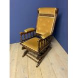 Traditional American style spring base rocking chair upholstered in lemon draylon. Condition sound