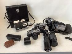 Quantity of photographic cameras, lenses to include. Canon AAT-1, camera body, no cover with lens,