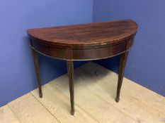 C19th inlaid mahogany foldover demi lune baize lined card table. 95cm Diam. Condition: General