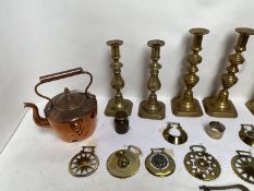 Quantity of antique & later copper & brass wares including horse brasses, candlesticks etc.