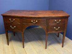 Good George III mahogany bow front sideboard of a central drawer flanked by two deep drawers one