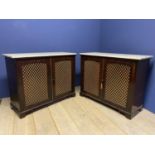 Pair Regency mahogany marble top side cabinets with brass grille doors, each 113cm L x 44cm D x 91cm