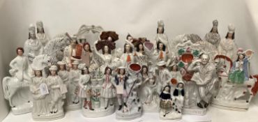 Collection of 20 mid C19th Staffordshire pottery flat back figures including mounted figures.